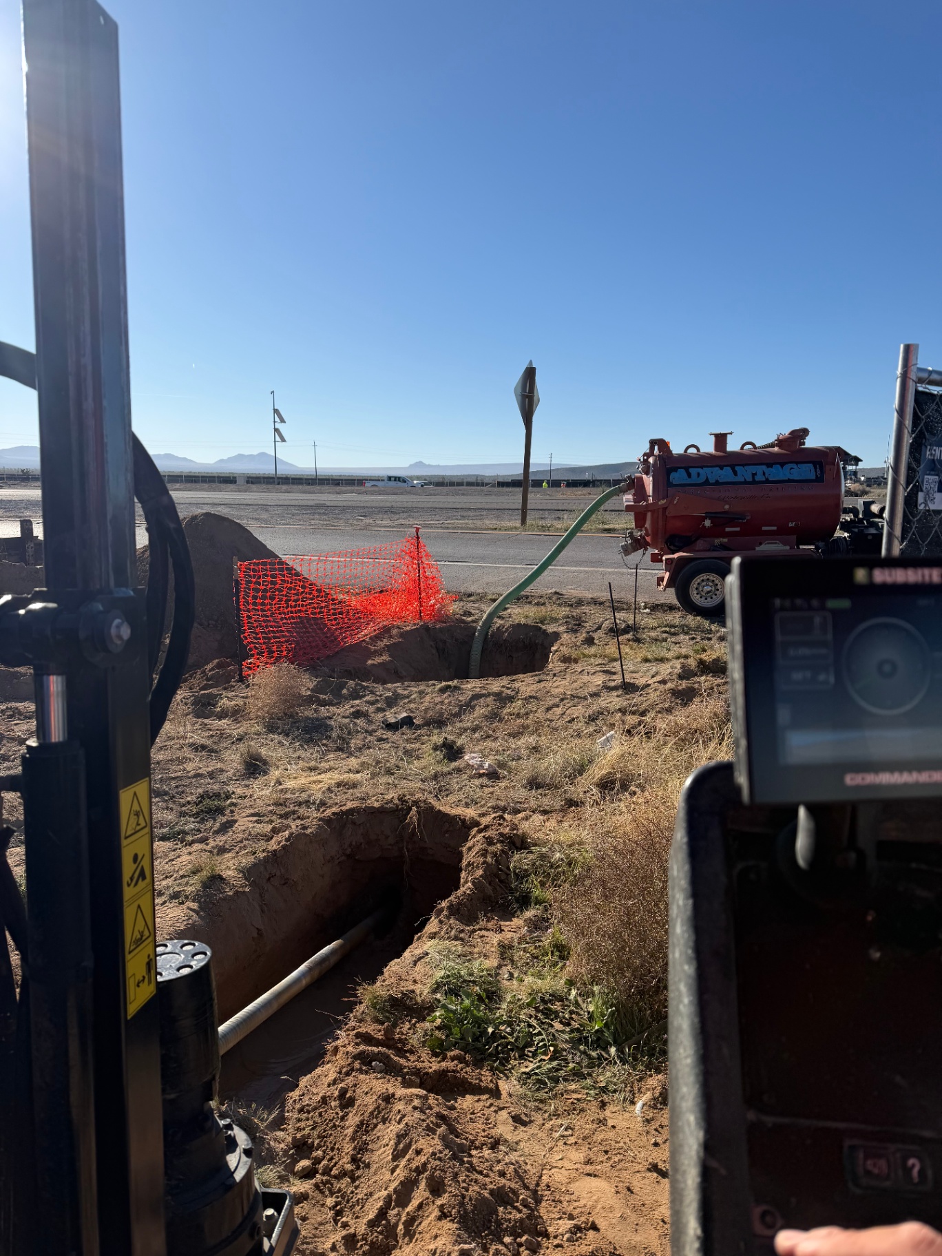 Hydro vac potholing alongside the bore path